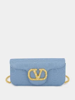 Blue Loc Moir Fabric Clutch with Jewel Logo