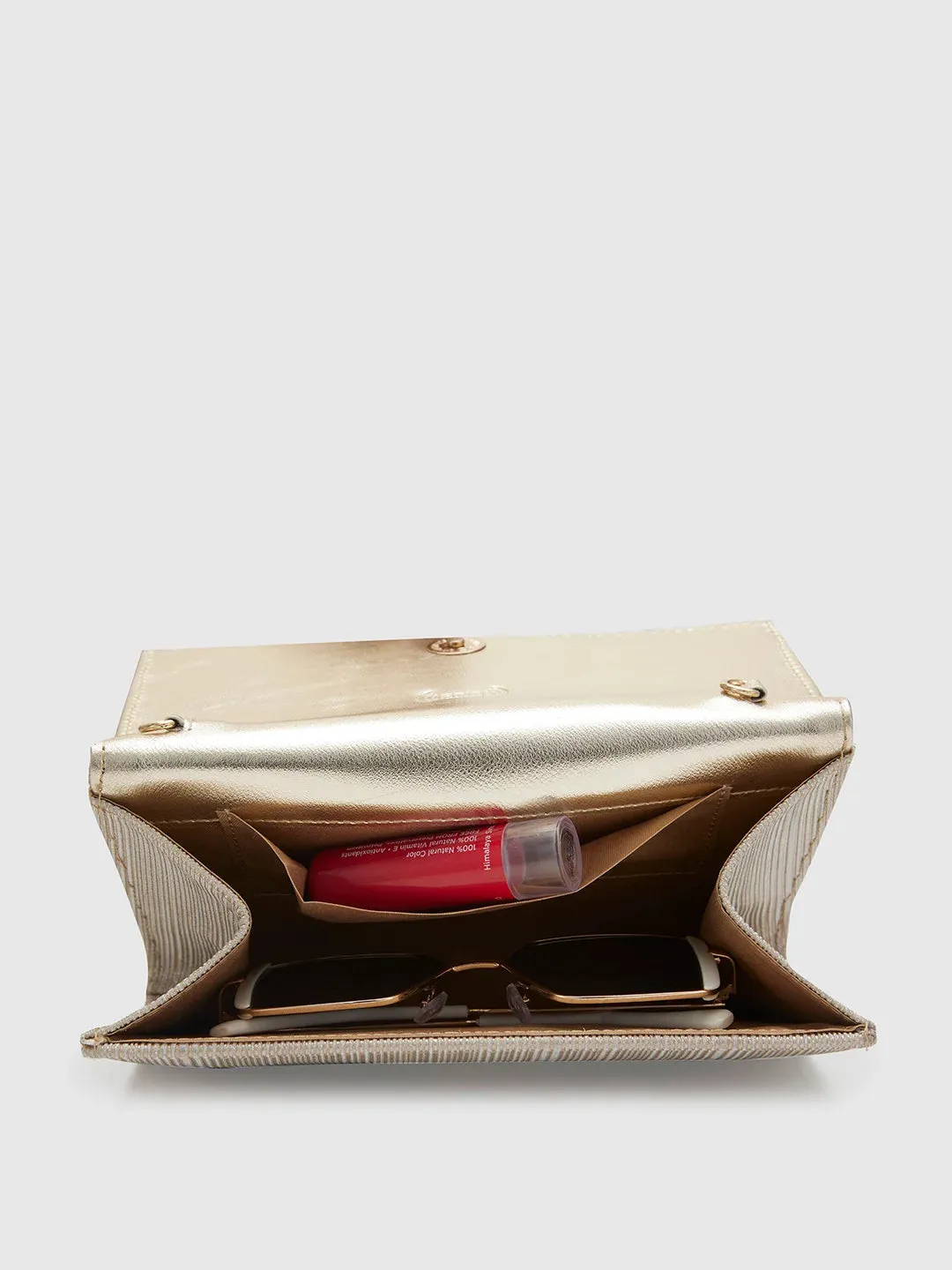 Caprese Bertha Medium Light Gold Clutch