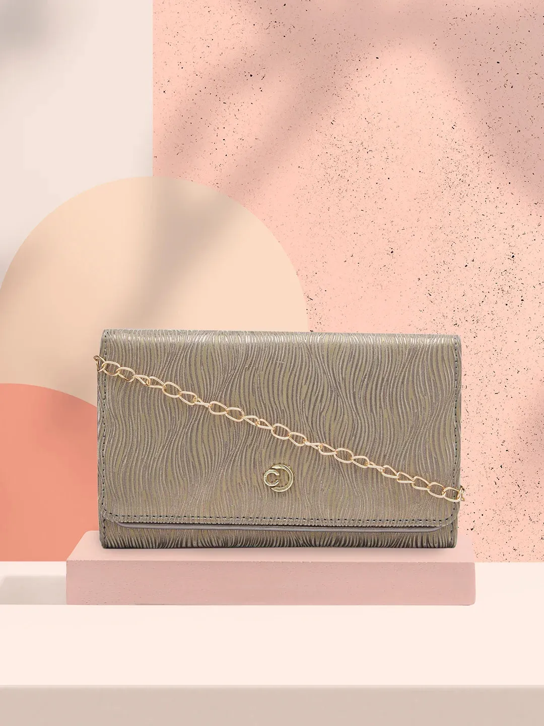 Caprese Eryka Medium Champagne Gold Clutch