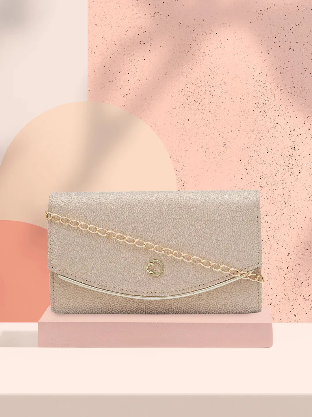 Caprese Gretchen Medium Champagne Gold Flapover Clutch