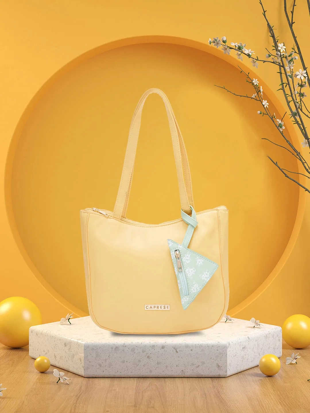 Caprese Pyxis Medium Yellow Satchel Bag