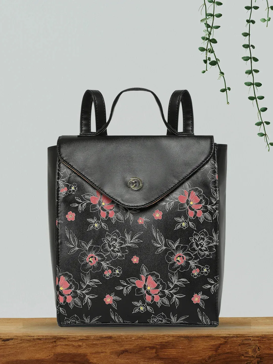 Caprese Snow Printed Medium Black Backpack
