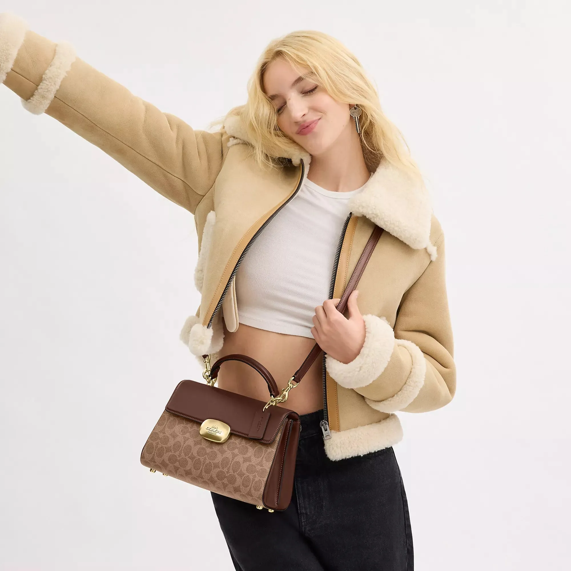Coach Outlet Eliza Top Handle Bag In Signature Canvas