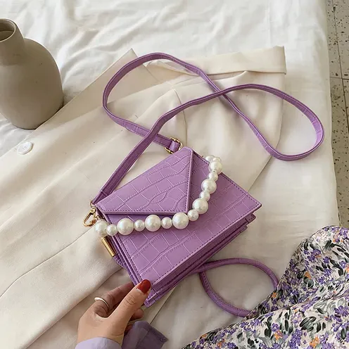 Conchita Handbags