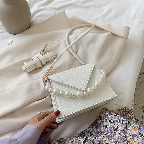 Conchita Handbags