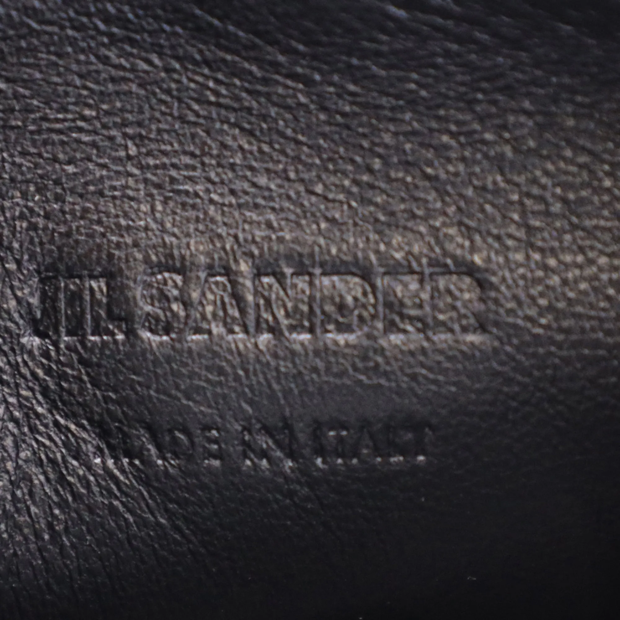 Jil Sander Leather-Trimmed Shearling Pouch in White Synthetic
