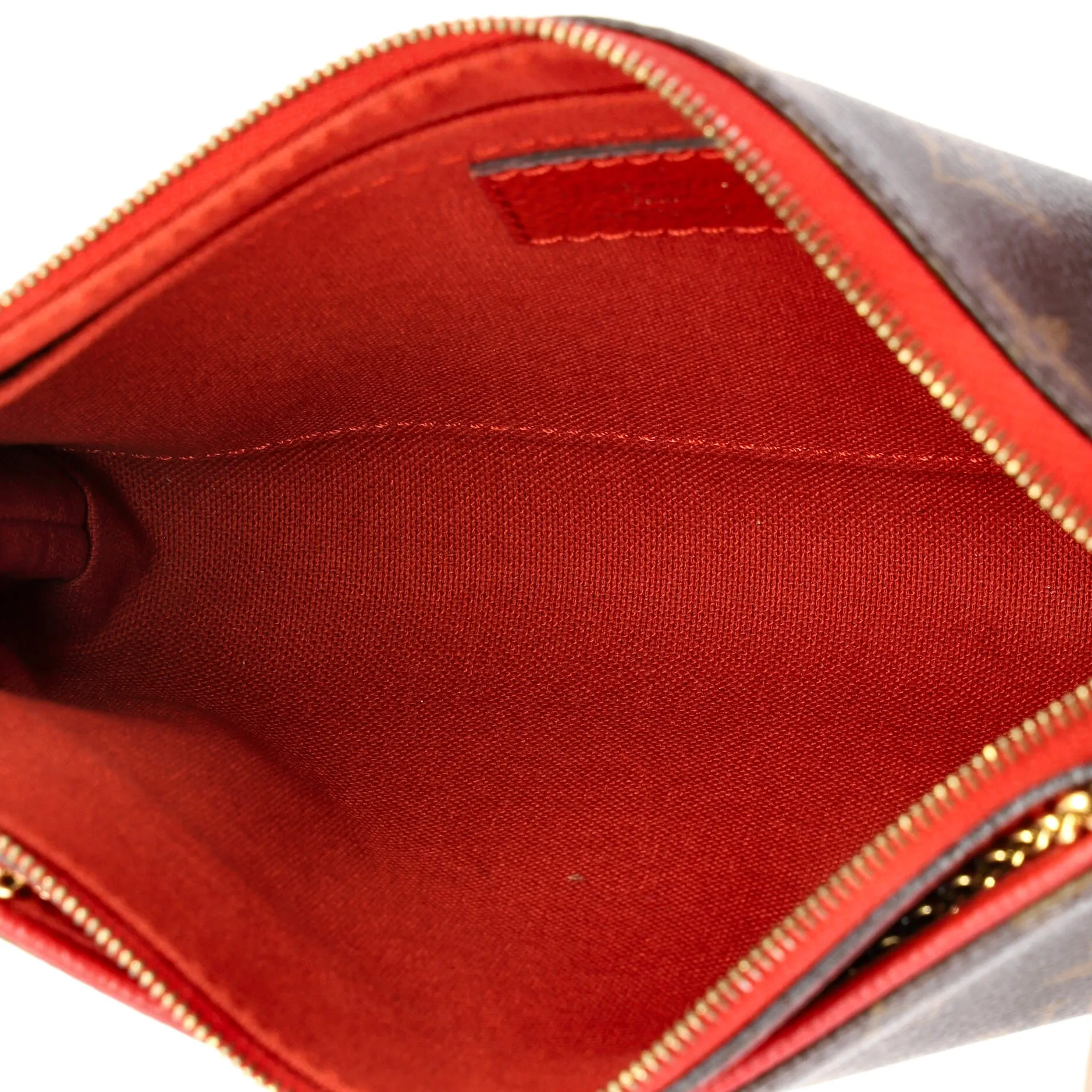 Pallas Clutch Monogram Canvas with Leather